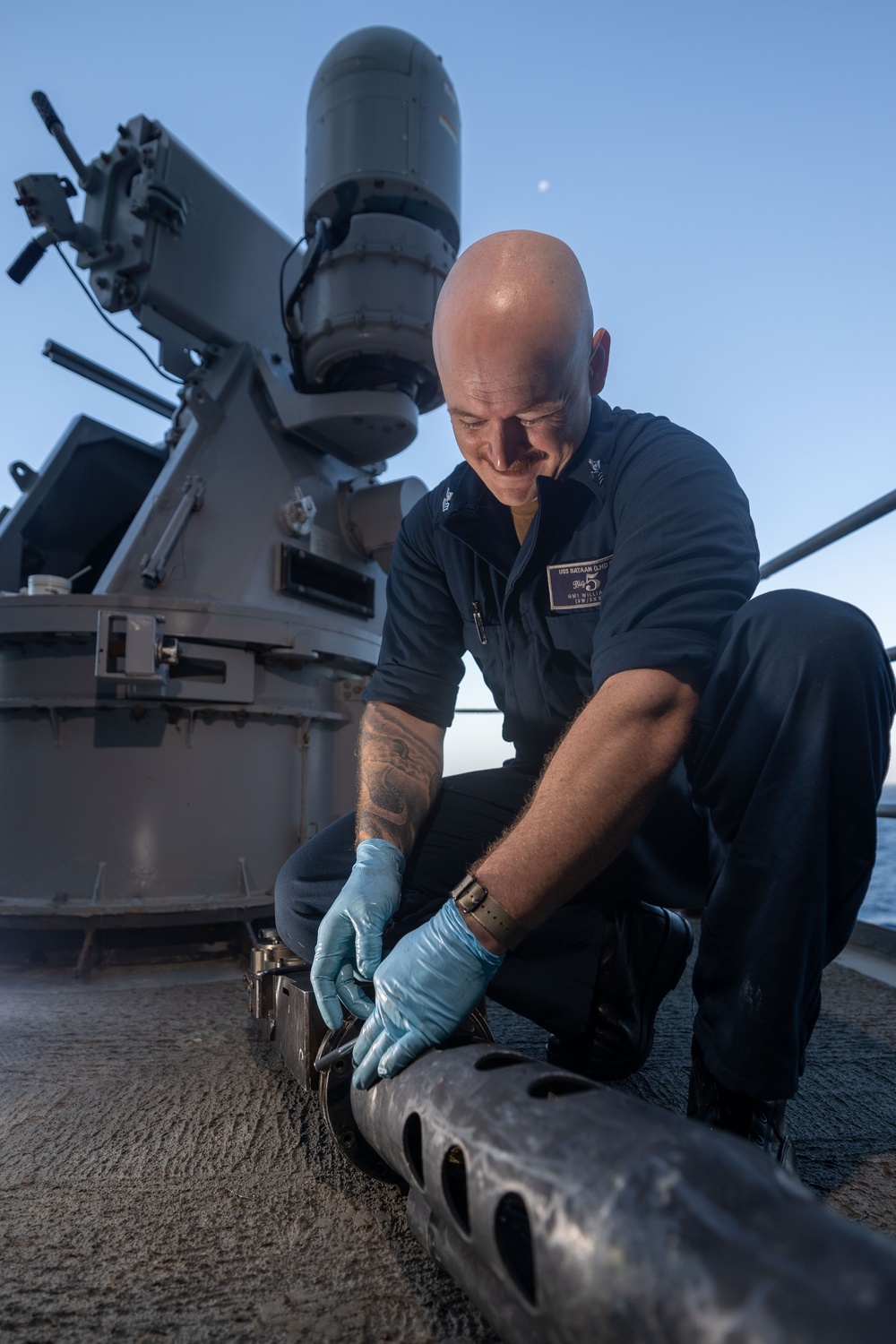 USS Bataan Conducts Mark 38 Gun Weapon System Maintenance