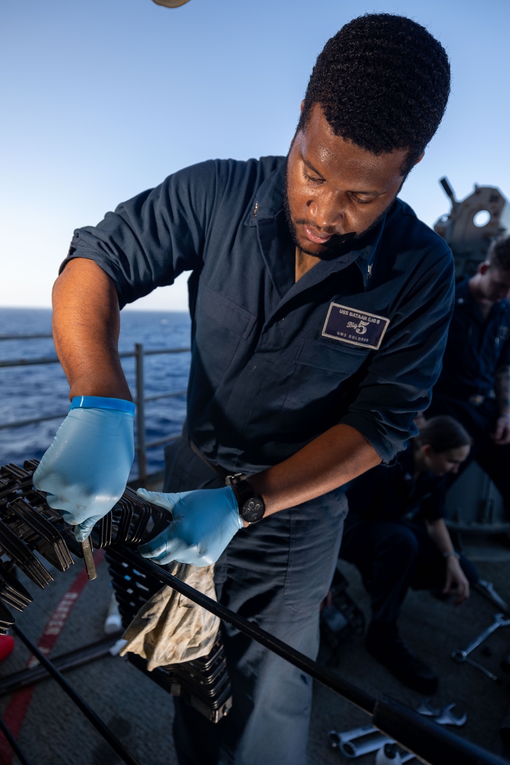 USS Bataan Conducts Mark 38 Gun Weapon System Maintenance