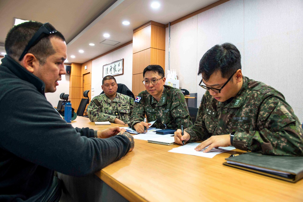 USS Carl Vinson (CVN 70) Sailors work with ROK Sailors
