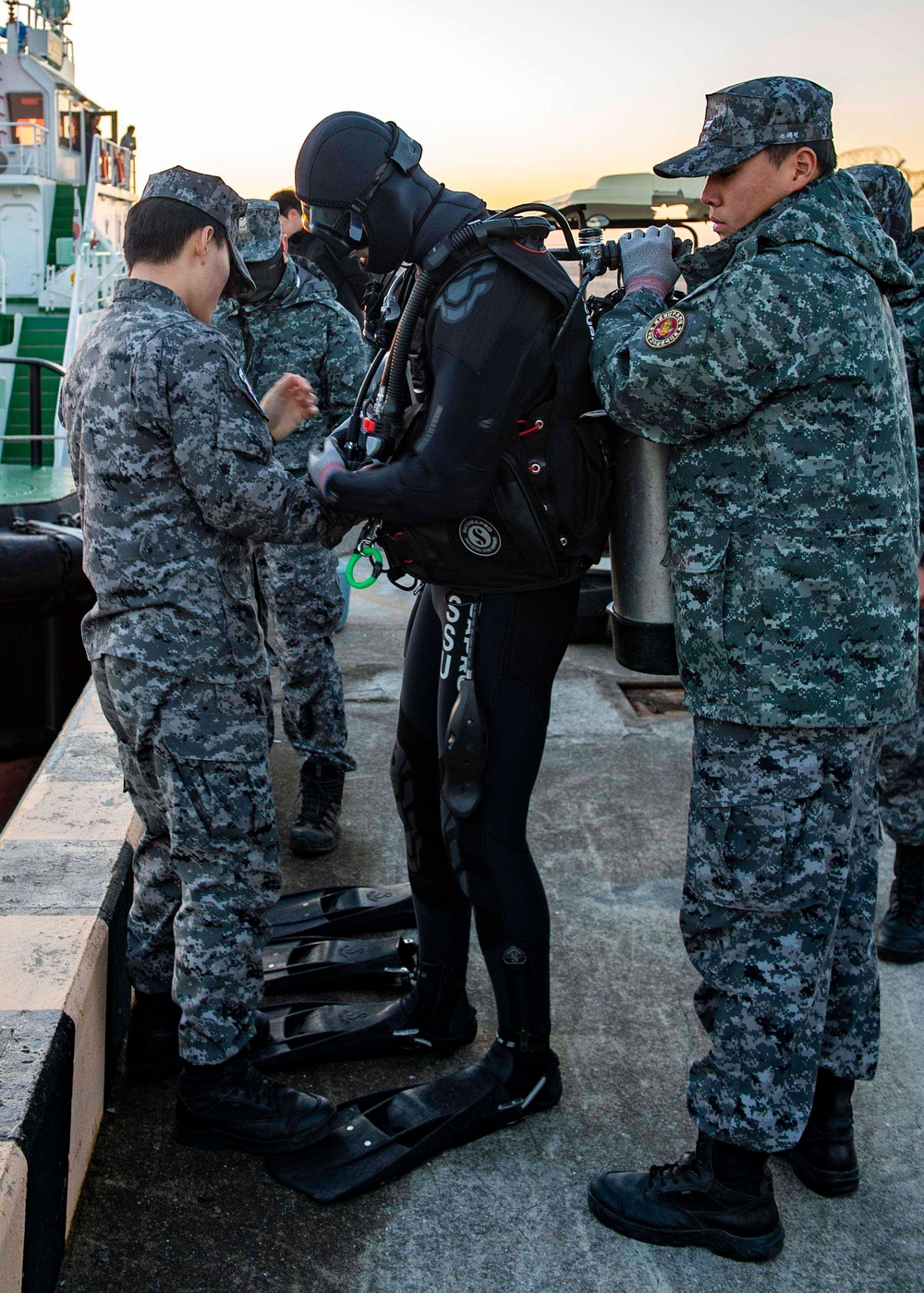 USS Carl Vinson (CVN 70) Sailors work with ROK Sailors