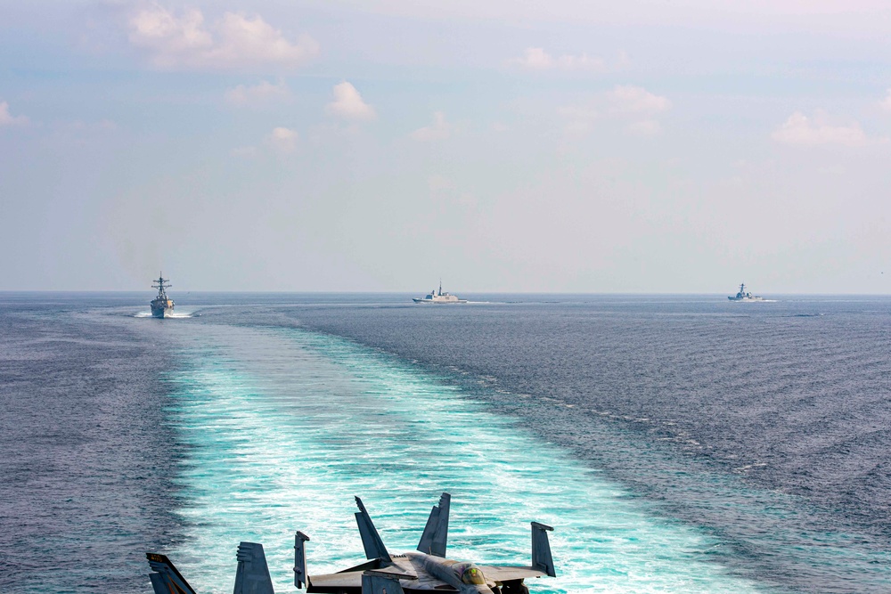 The Eisenhower Carrier Strike Group Transits the Strait of Hormuz