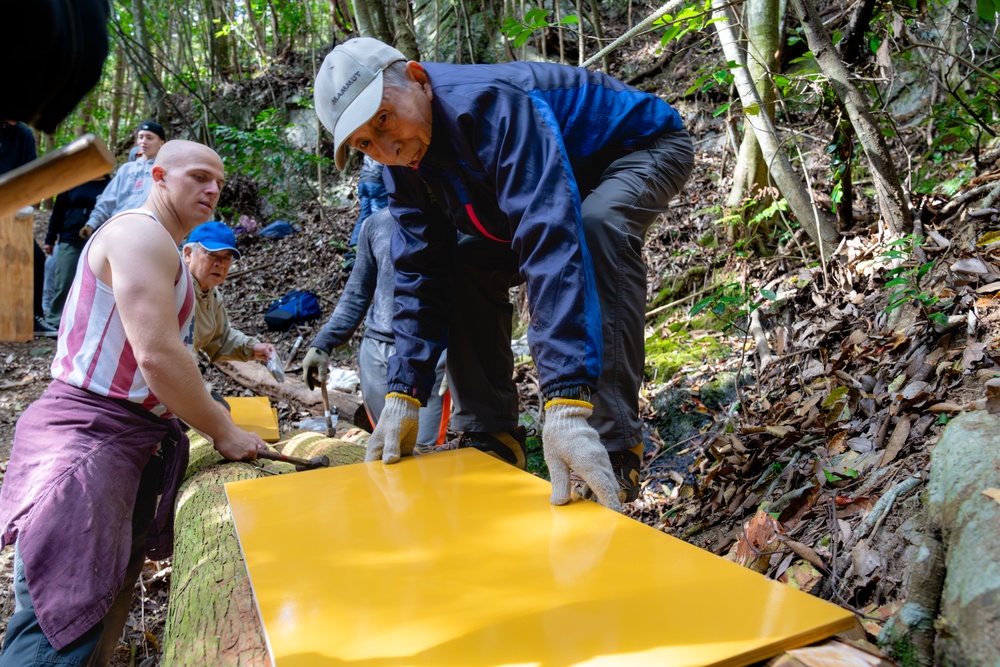 Marines from Marine Corps Air Station Iwakuni conduct maintenance at Iwakuni Old Road