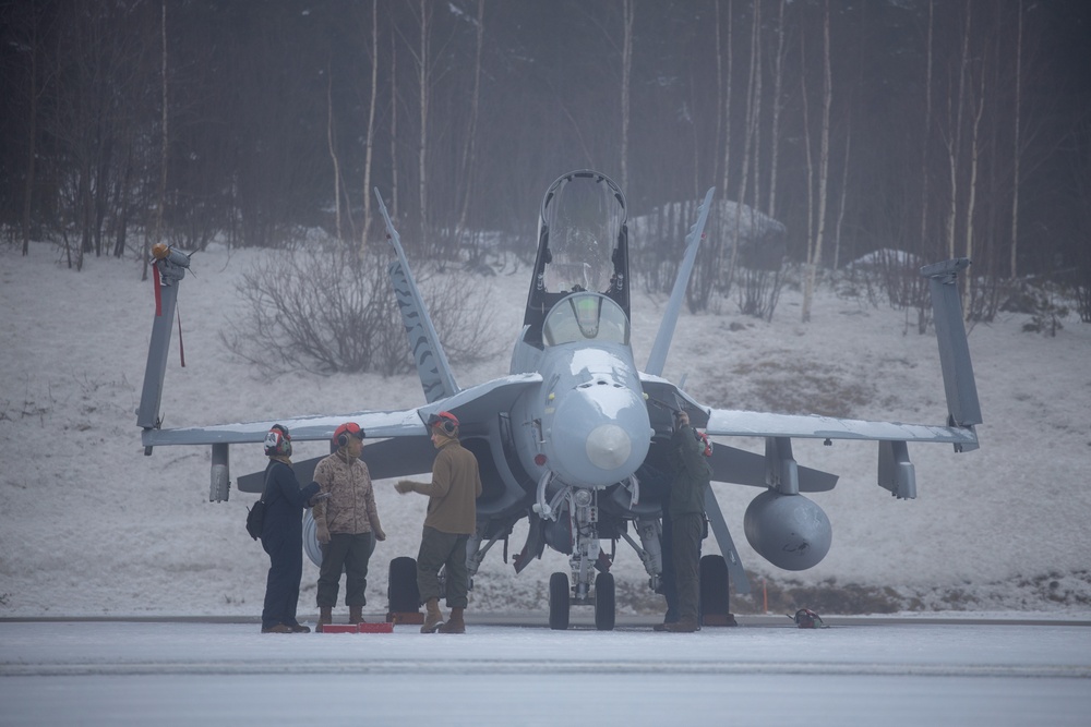 Freezing Winds 23: Marines with Marine All Weather Fighter Attack Squadron 224 prepare F/A-18s for take off