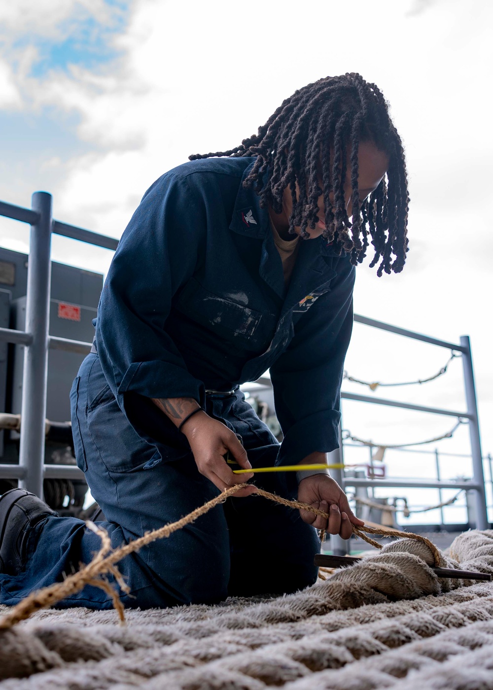 USS Carl Vinson (CVN 70) Sailors Conduct Mooring Line Maintenance