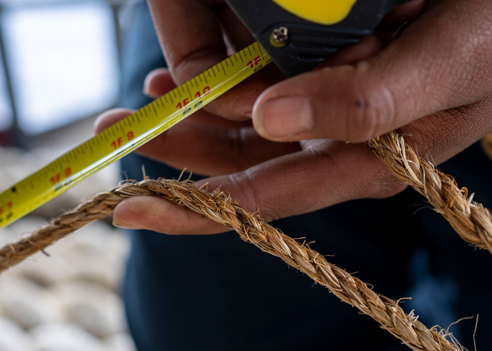 USS Carl Vinson (CVN 70) Sailors Conduct Mooring Line Maintenance