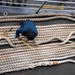 USS Carl Vinson (CVN 70) Sailors Conduct Mooring Line Maintenance