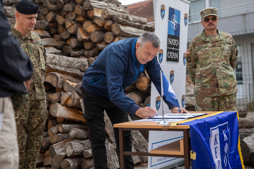 KFOR CIMIC Team supplies school district with log splitter