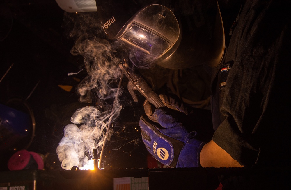 USS Ronald Reagan (CVN 76) Sailors practice welding