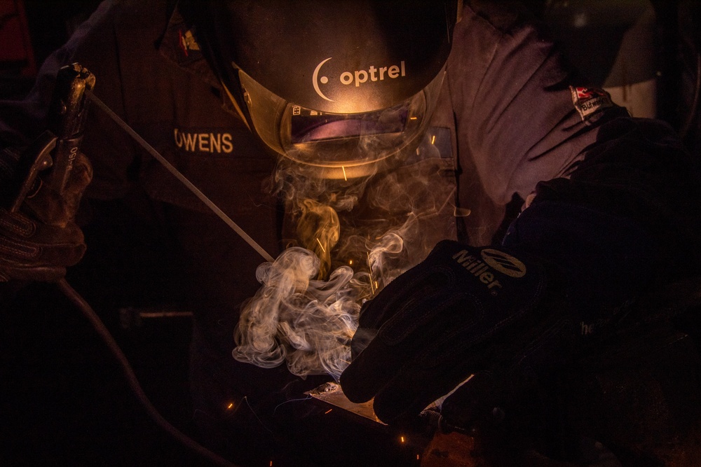 USS Ronald Reagan (CVN 76) Sailors practice welding