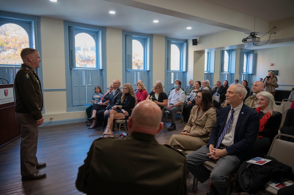 Family, friends, USAMMDA team gather to mark milestone promotion at Civil War medicine museum