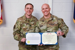 Master Sgt. Chris Vine, 245th ATCS, receives Bronze Star Medal