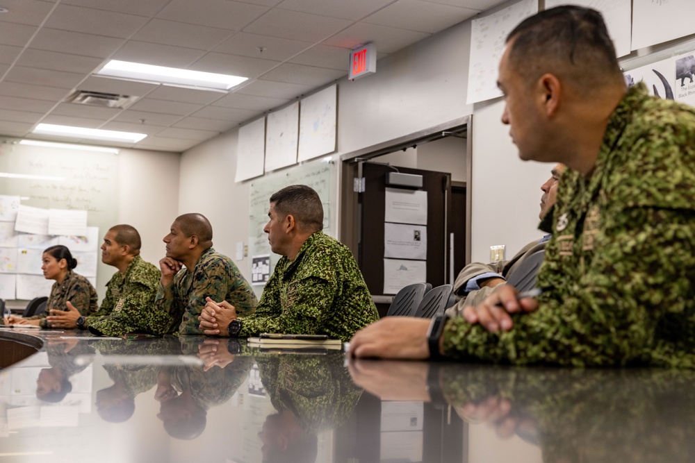 A Colombian marine corps delegation visits the Naval Small Craft Instruction and Technical Training School