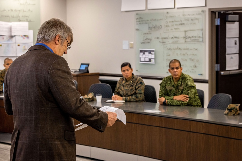 A Colombian marine corps delegation visits the Naval Small Craft Instruction and Technical Training School