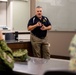 A Colombian marine corps delegation visits the Naval Small Craft Instruction and Technical Training School