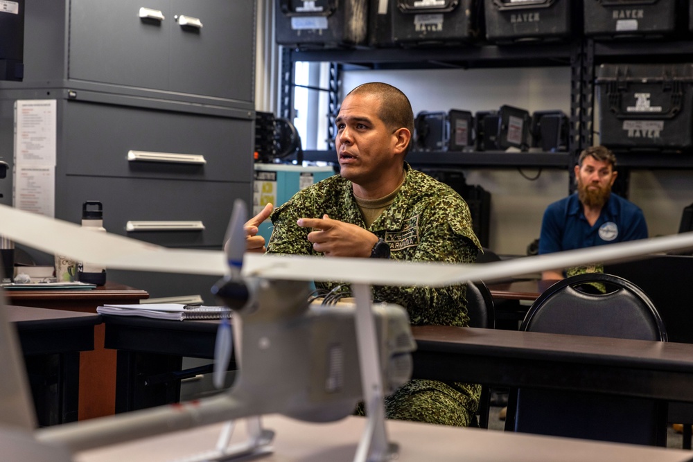 A Colombian marine corps delegation visits the Naval Small Craft Instruction and Technical Training School