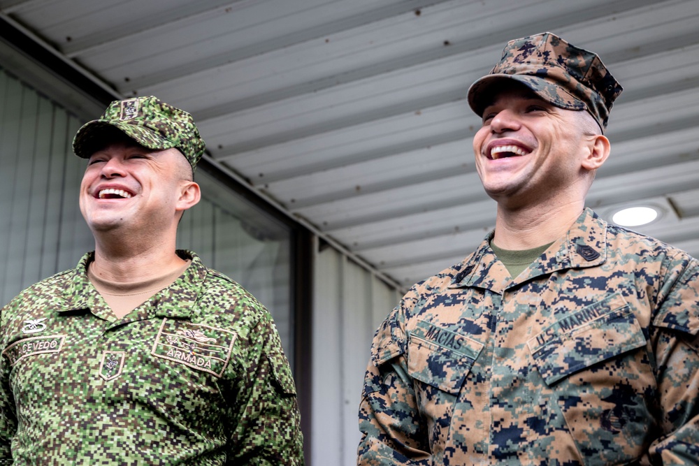 A Colombian marine corps delegation visits the Naval Small Craft Instruction and Technical Training School