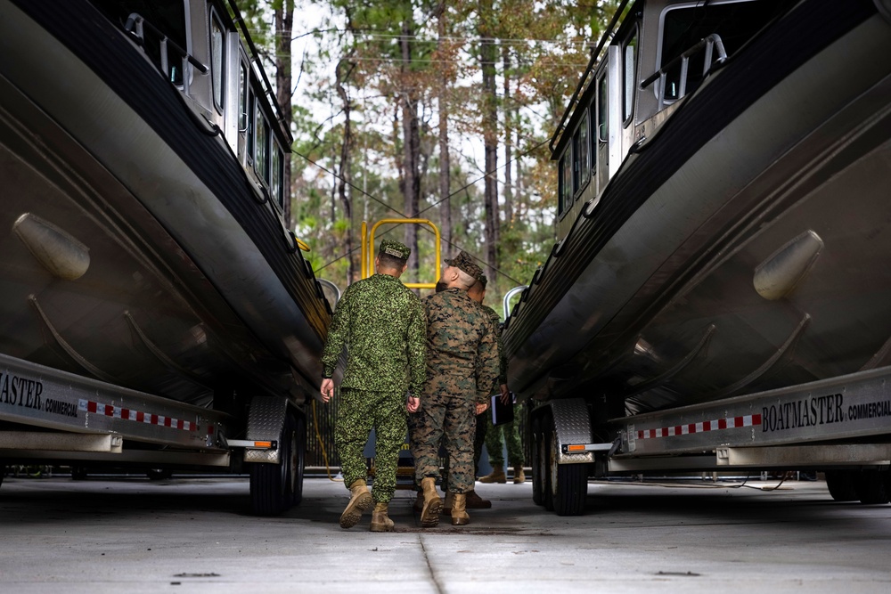 A Colombian marine corps delegation visits the Naval Small Craft Instruction and Technical Training School