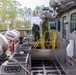 A Colombian marine corps delegation visits the Naval Small Craft Instruction and Technical Training School