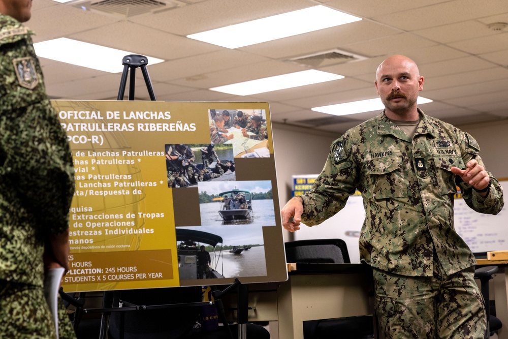 A Colombian marine corps delegation visits the Naval Small Craft Instruction and Technical Training School