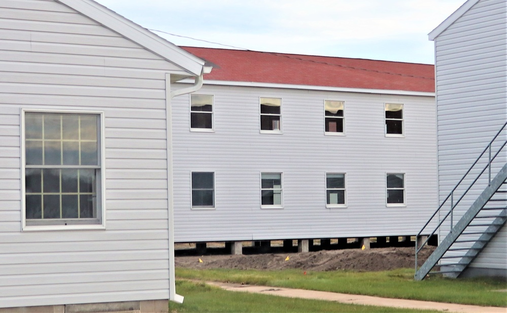 Contractors finish moving World War II-era barracks buildings to new foundations at Fort McCoy