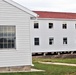 Contractors finish moving World War II-era barracks buildings to new foundations at Fort McCoy