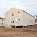 Contractors finish moving World War II-era barracks buildings to new foundations at Fort McCoy