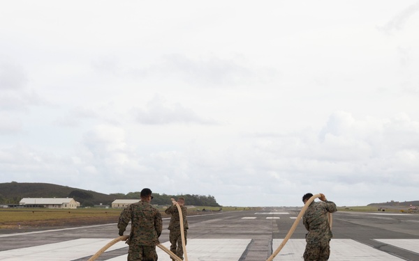 Defueling Operations are conducted on downed U.S. Navy P-8A Poseidon
