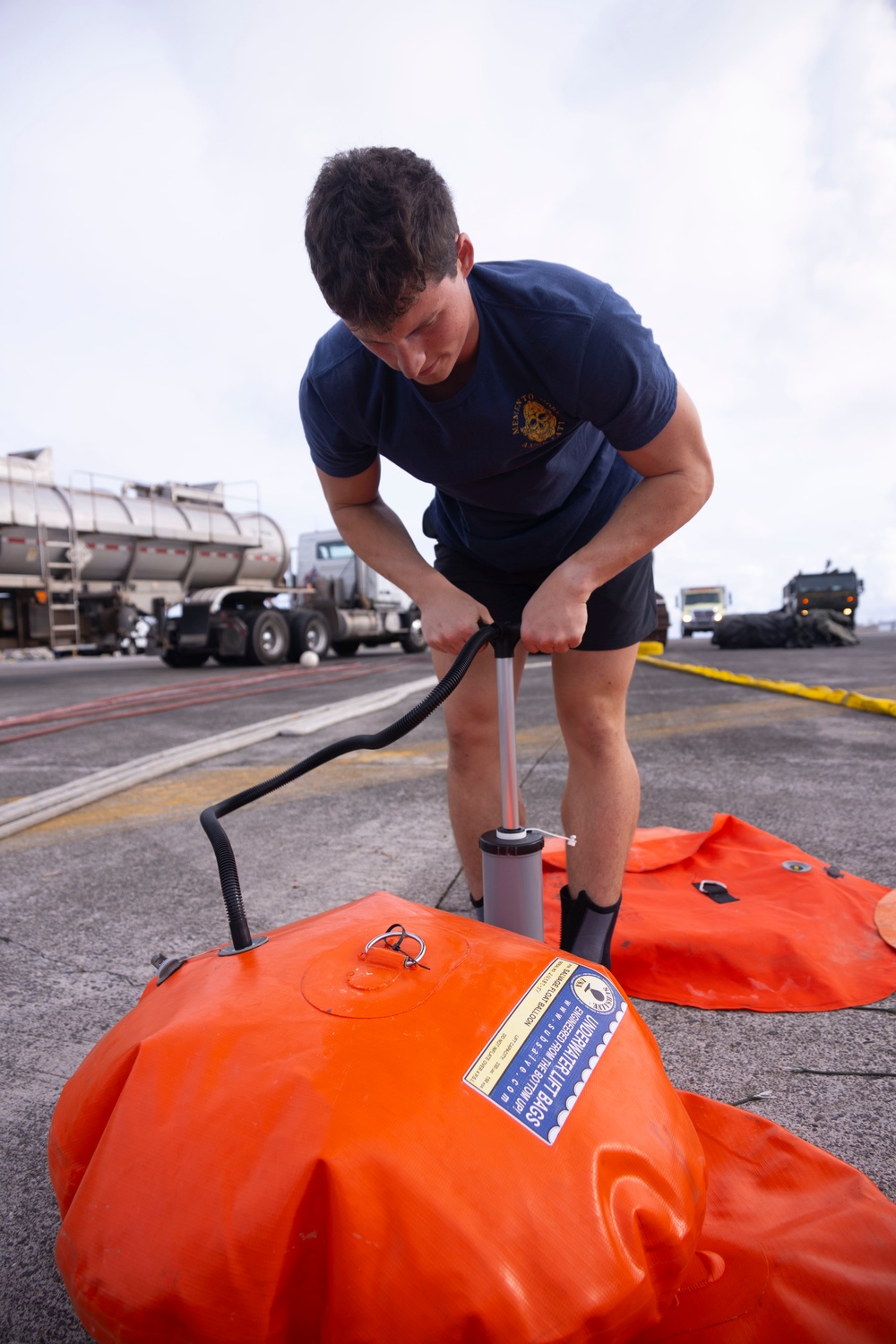 Defueling Operations are conducted on downed U.S. Navy P-8A Poseidon