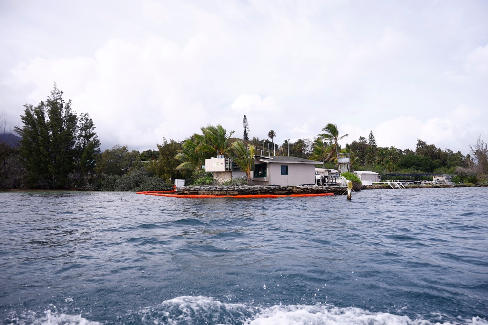 Defueling Operations are conducted on downed U.S. Navy P-8A Poseidon