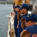 Coast Guard Cutter Polar Star (WAGB-10) crew renders honors to the USS Arizona