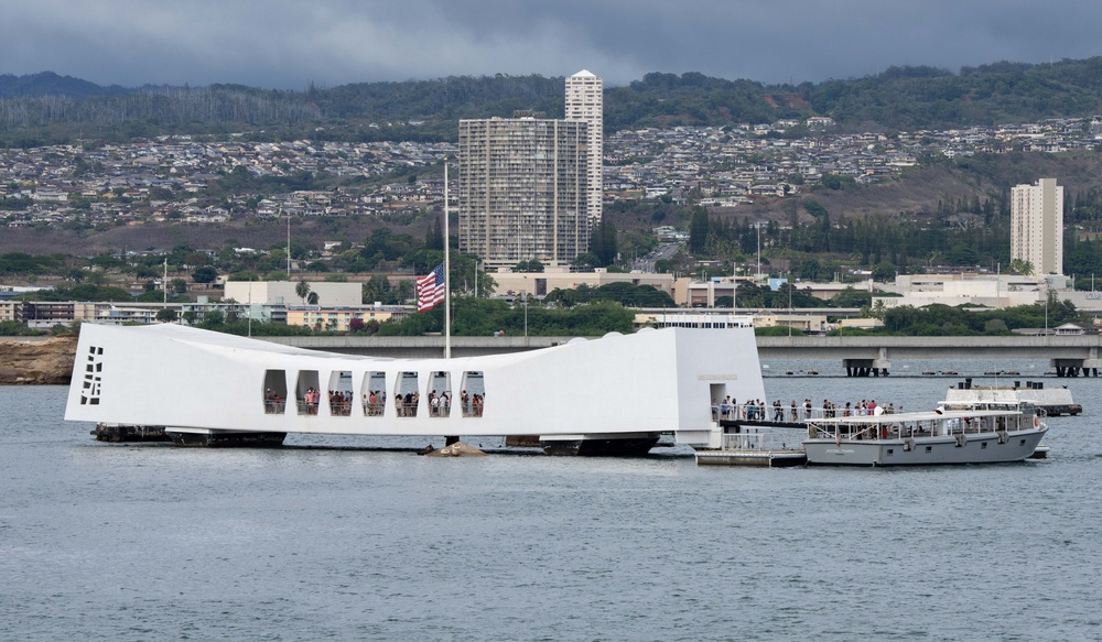 Coast Guard Cutter Polar Star (WAGB-10) crew renders honors to the USS Arizona