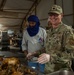 Service members share Thanksgiving meal down range