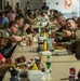 Service members share Thanksgiving meal down range