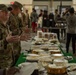 Service members share Thanksgiving meal down range