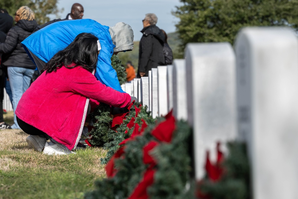 Volunteers lay Wreaths at Veterans Cemetery