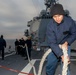 Sailors aboard the USS Rafael Peralta (DDG 115) conduct sea and anchor detail in Yokosuka, Japan