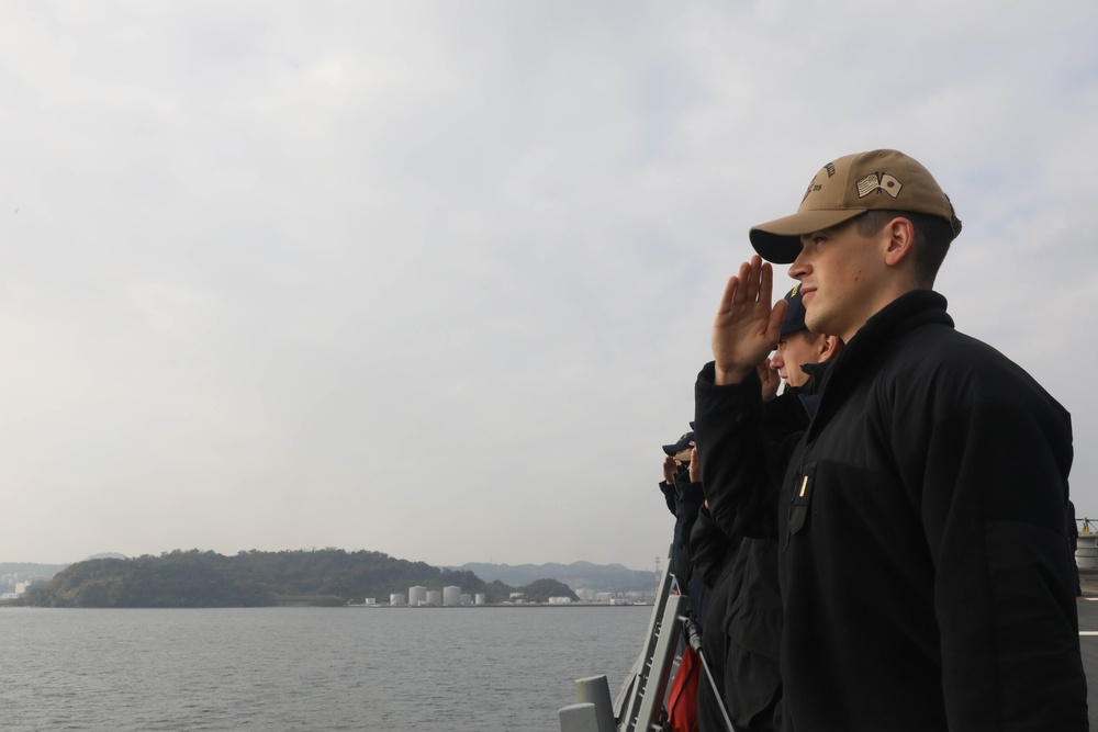 Sailors aboard the USS Rafael Peralta (DDG 115) conduct sea and anchor detail in Yokosuka, Japan