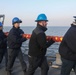 Sailors aboard the USS Rafael Peralta (DDG 115) conduct sea and anchor detail in Yokosuka, Japan