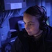 Sailors aboard the USS Rafael Peralta (DDG 115) stand watch in the combat information center in the Taiwan Strait