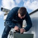 USS Kidd (DDG 100) Sailor Loads Close-In Weapons System (CIWS)