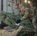 NY National Guard Soldiers Volunteer to Load Trees for Troops