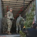 NY National Guard Soldiers Volunteer to Load Trees for Troops