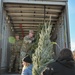 NY National Guard Soldiers Volunteer to Load Trees for Troops