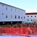 Contractors finish moving World War II-era barracks buildings to new foundations at Fort McCoy