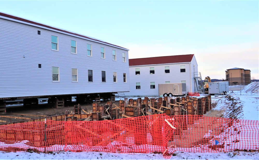 Contractors finish moving World War II-era barracks buildings to new foundations at Fort McCoy