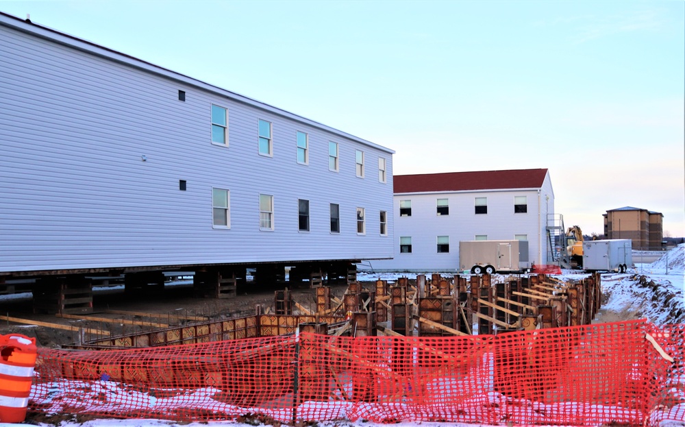 Contractors finish moving World War II-era barracks buildings to new foundations at Fort McCoy