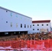 Contractors finish moving World War II-era barracks buildings to new foundations at Fort McCoy