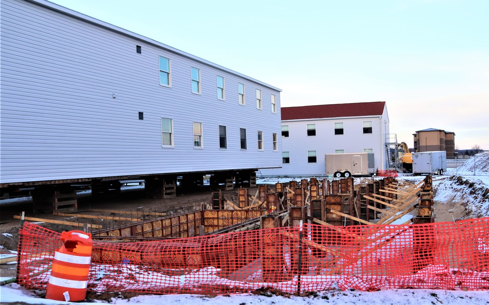 Contractors finish moving World War II-era barracks buildings to new foundations at Fort McCoy