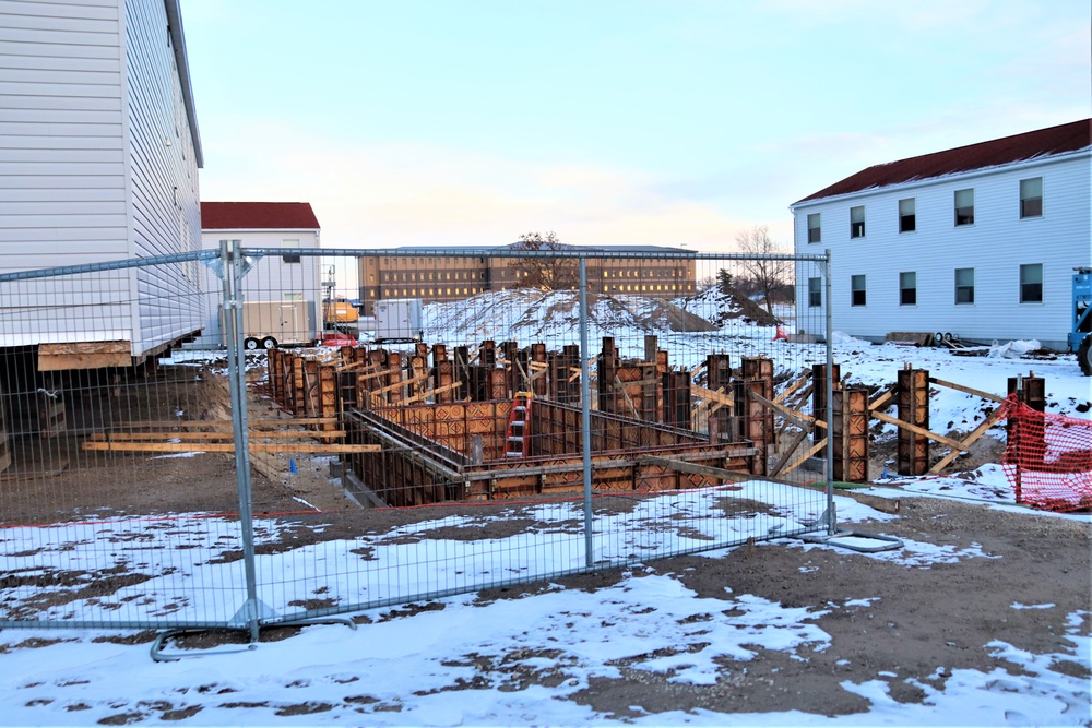 Contractors finish moving World War II-era barracks buildings to new foundations at Fort McCoy