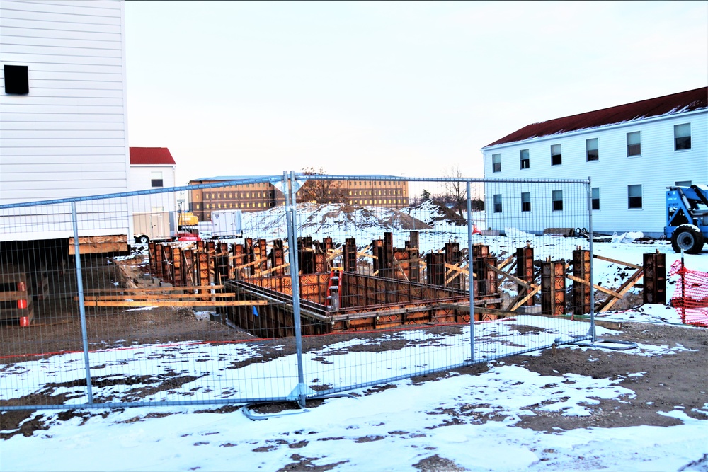 Contractors finish moving World War II-era barracks buildings to new foundations at Fort McCoy